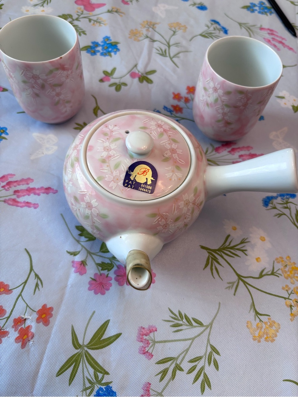 Authentic Japanese Pink Sakura Kyushu teapot and tuning cup set
